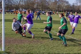 AFC Hilsea (purple) v Saturn Royale. Picture: Mike Cooter