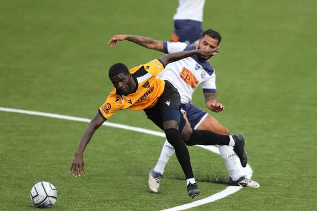 Billy Clifford, right, in action for Hawks during their opening NL South match of 2020/21 against Maidstone on October 10. They would only play 13 more before the campaign was declared null and void.. Picture by Dave Haines.