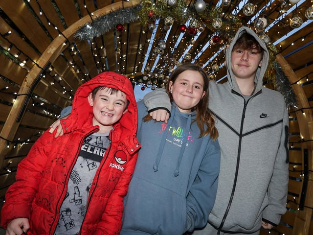 From left, Elliot Channing, 7, Iris Channing, 9, and Ollie Channing, 16. Whiteley Christmas Event, Whiteley Shopping CentrePicture: Chris  Moorhouse (071224-36)