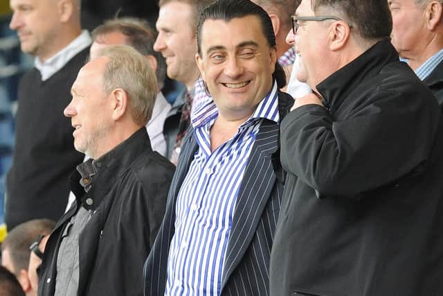 King's Lynn owner Stephen Cleeve, centre, is bringing his team to Fratton Park on Saturday - and the club where his grandad was a season-ticket holder