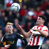 Regan Poole's versatility in defence appeals to John Mousinho. Picture: George Wood/Getty Images