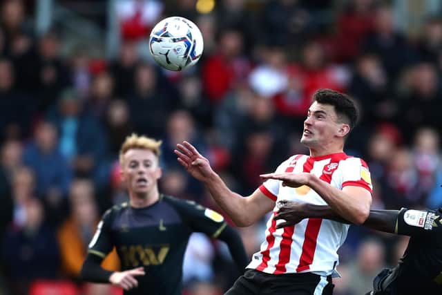 Regan Poole's versatility in defence appeals to John Mousinho. Picture: George Wood/Getty Images