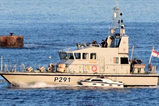 HMS Puncher pictured towing the stricken fishing boat back to shore. Photo: Royal Navy/RFANostalgia