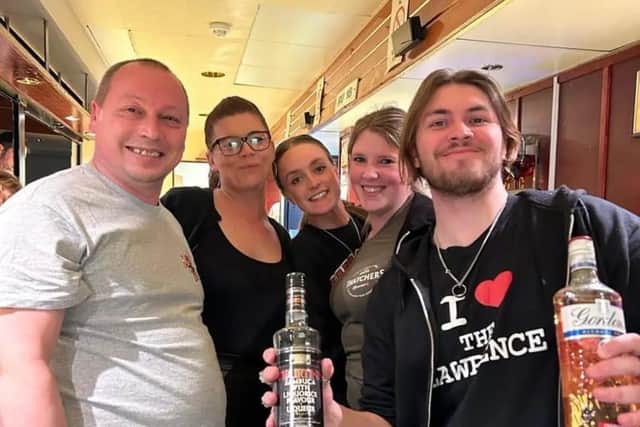 Staff from the Lawrence Arms in Southsea have been keeping busy while the pub is closed for repair by working shifts at other local businesses.
Pictured is Dev Wearn (left) with some of his staff helping at another pub.