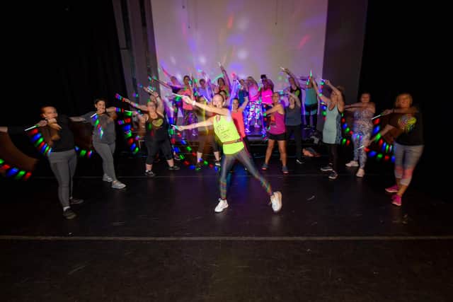Josie Stickley runs Clubbercise - a dancing keep fit class.

Pictured: Josie Stickley with her class at Park Community School, Havant on Thursday 7th October 2021

Picture: Habibur Rahman