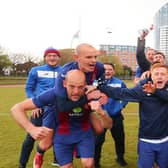 Tom Jeffes, left, gives Harry Birmingham a piggyback after US Portsmouth's FA Vase victory against Flackwell Heath. Picture: Stuart Martin