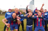 Tom Jeffes, left, gives Harry Birmingham a piggyback after US Portsmouth's FA Vase victory against Flackwell Heath. Picture: Stuart Martin