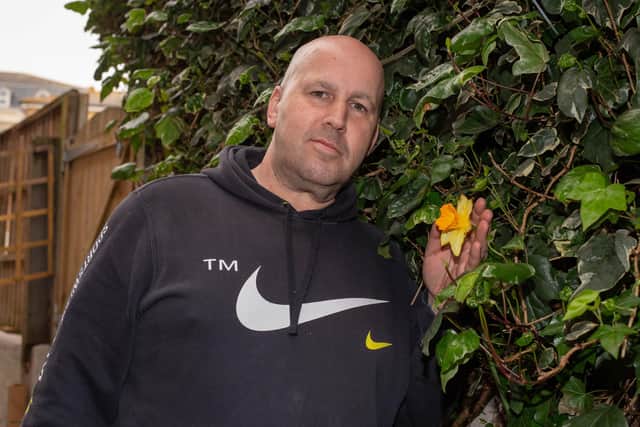 Ivan Jones with the giant daffodil.
Picture Habibur Rahman