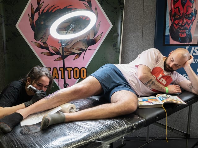 The Mountbatten Centre held the two day event which gathered together more than one hundred world-class tattoo artists. In this picture Kit Wagstaff works on the leg of Yohan.

Picture: Keith Woodland