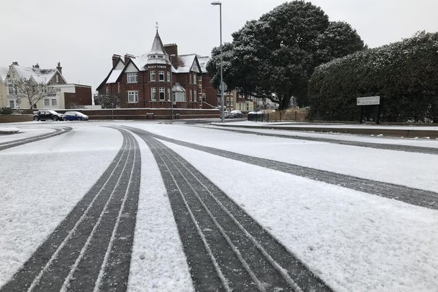 Tyre tracks through the snow stretch into the distance at Southsea
Credit: Byron Melton/The News Portsmouth