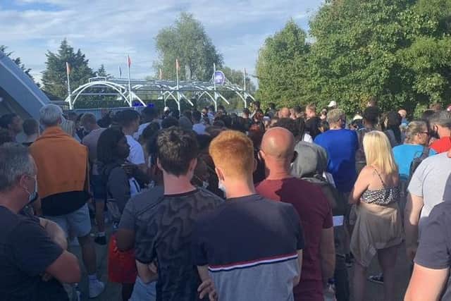 A crowd of people at Thorpe Park in Surrey after a stabbing happened at the theme park. Picture: @abbiesear29/PA Wire