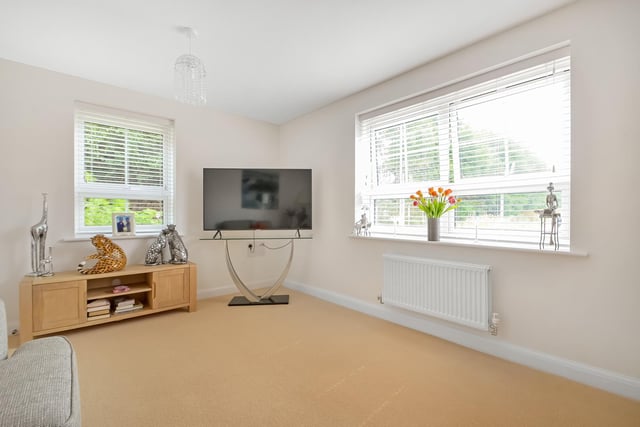 This three bedroom property is on the market at a guide price of £415,000. It is listed by Town and Country.