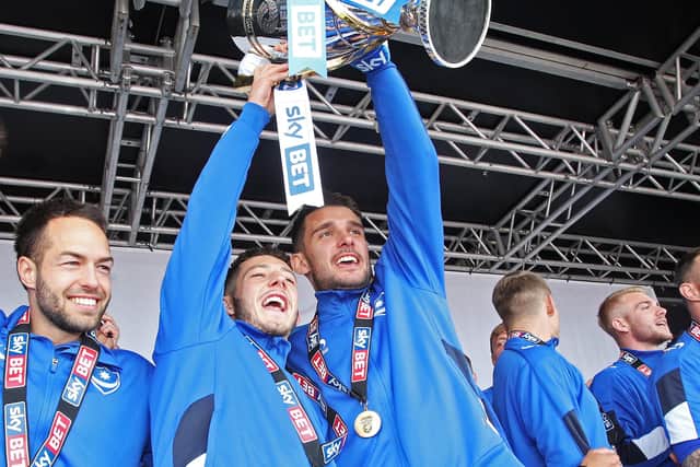 Gareth Evans and his team-mates celebrate Pompey's League Two title triumph in May 2017. Picture: Joe Pepler