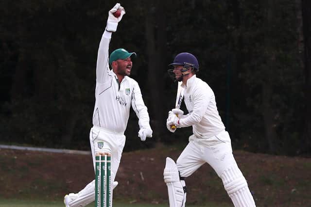 Sarisbury wicket-keeper Simon Orr celebrates the dismissal of Hambledon  captain Spencer Leclercq. Picture: Sam Stephenson