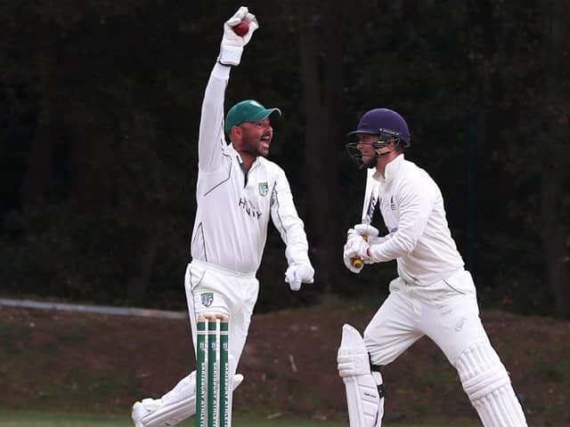Sarisbury wicket-keeper Simon Orr celebrates the dismissal of Hambledon  captain Spencer Leclercq. Picture: Sam Stephenson