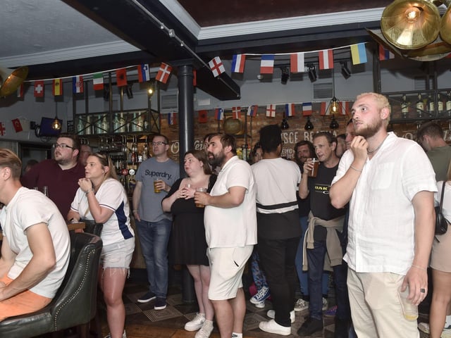 England fans at O'Neils in Albert Road, Southsea, watching the England v Denmark match in the Euro's.
Picture: Sarah Standing (200624-4693)