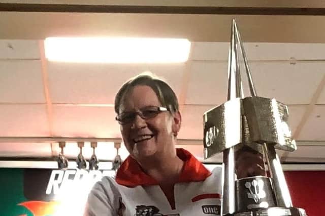 Southsea's Jane Monaghan stands proudly with the British Internationals trophy she helped England Ladies win on her international debut