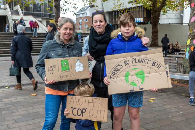 Placards at the COP26 demonstration. Picture: Mike Cooter (061121)