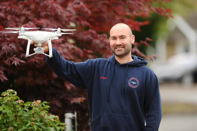 Antony Rumming (38) from Denmead, has set up a volunteer search and rescue drone group called Denmead Drone Search and Rescue, initially to find lost pets. With the help of his village, Denmead, the group has become a huge organisation and helps search for missing people across Hampshire 

Picture: Sarah Standing (090720-5460)