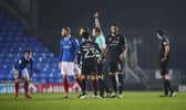 Jack Whatmough was shown a straight red card in the first half of tonight's Fratton Park clash with Lincoln. Picture:  Joe Pepler