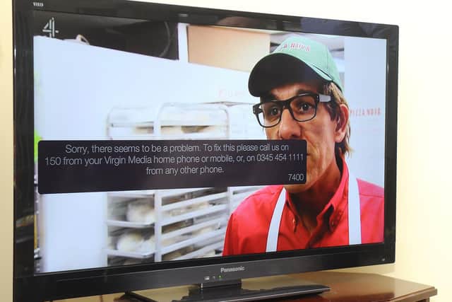The message on Sydney's television which prompted his call to Virgin Media, and the sale of the package. Picture: Sarah Standing (280220-9081)