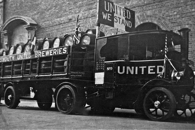Portsmouth United Breweries drayman's delivery lorry.As can be seen, it has been decorated for some reason with bunting and flags.Can anyone tell me what it might have been for and also, where is the exact location, notice the arches to the rear?Picture: Courtesy of Ray Rowsell.