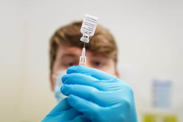 Pharmacist draws up the AstraZeneca/Oxford University Covid-19 vaccine. (Photo by Ian Forsyth/Getty Images)