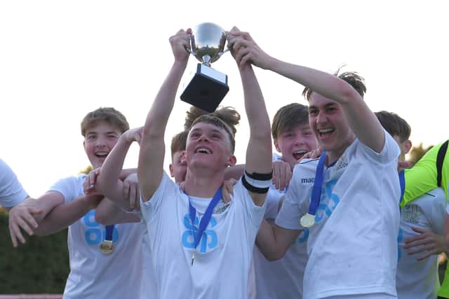 Henry Cort celebrate after beating Admiral Lord Nelson at Fareham Tow's Cams Alders ground to win the Hampshire Year 10 Cup (2019/20). Picture: Neil Marshall