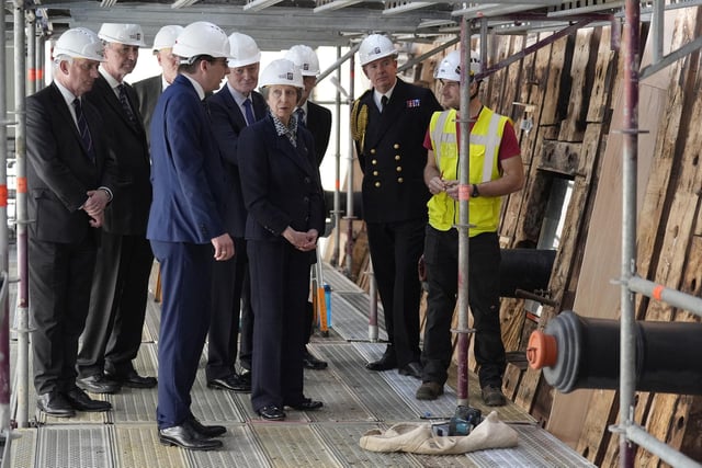 The Princess Royal (centre) during a visit to see the HMS Victory Conservation Project at the National Museum of the Royal Navy in Portsmouth Historic Dockyard.