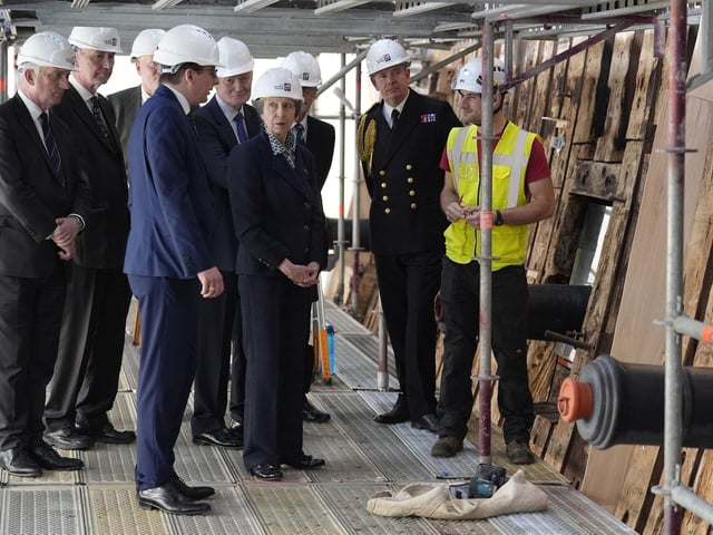 The Princess Royal (centre) during a visit to see the HMS Victory Conservation Project at the National Museum of the Royal Navy in Portsmouth Historic Dockyard.