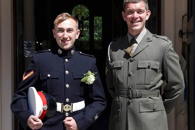 Lance Corporal Jake Kennedy pictured with his best man, Corporal Toby Robinson, right, during the wedding ceremony at St Ann's Church.