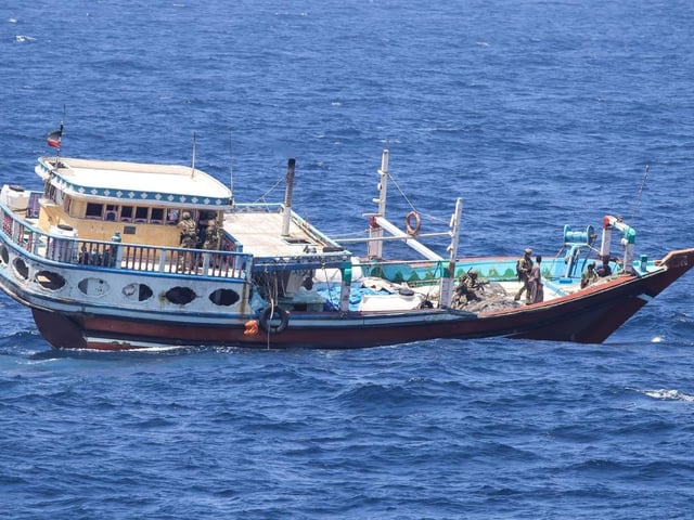 Royal Marine Boarding team conducting the boarding on the contact of interest - Portsmouth-based Type 45 destroyer seized £15m worth of drugs from smugglers operating in the Indian Ocean.