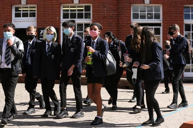 Priory School pupils moving between lessons wearing their face masks.

Picture: Chris Moorhouse