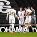 Mk Dons' Joe Mason clutches the match ball following his 28-minute hat-trick against Fleetwood on Tuesday night. Picture: Zac Goodwin/PA Wire