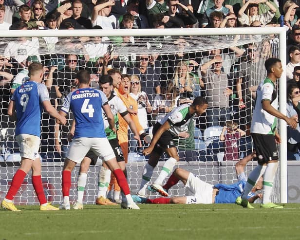 Plymouth's Brendan Galloway was shown a second yellow card on Saturday after pushing Michael Morrison to the ground in stoppage time. Picture: Barry Zee