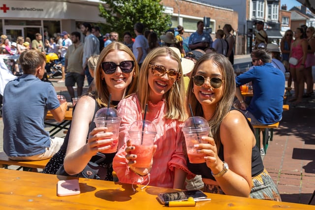 Uni friends reunite for cocktails at the Southsea Food Festival. Pictured: Rachel Grimston (28), Amy Joyce (28) and Holly Theo (28). Picture: Mike Cooter (160722)
