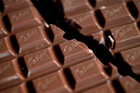 A Cadbury Dairy Milk share bar has reduced in size by 10 per cent, and costs the same. Picture: Matt Cardy/Getty Images.