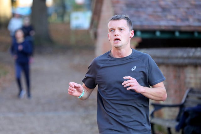 Flynn Powell crosses the line first at Havant parkrun, Staunton Country Park