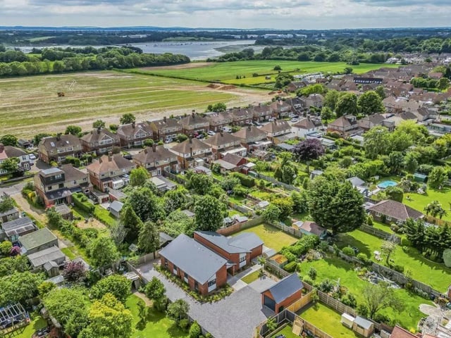 This property comes with four bedrooms, three bathrooms and two reception rooms.