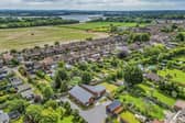 This property comes with four bedrooms, three bathrooms and two reception rooms.