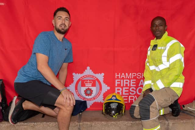Matt Green, from Portico, and Cosham firefighter and charity fundraiser Storms Menri. Picture: Keith Woodland