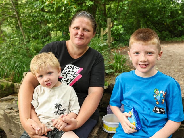 Amy Dorricott with her children, Toby, 2, and Harry, 6, at Play Day, Holly Hill Woodland Park.Picture: Chris Moorhouse (140824-08)