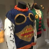 Some of Gyles Brandreth's colourful collection of jumpers