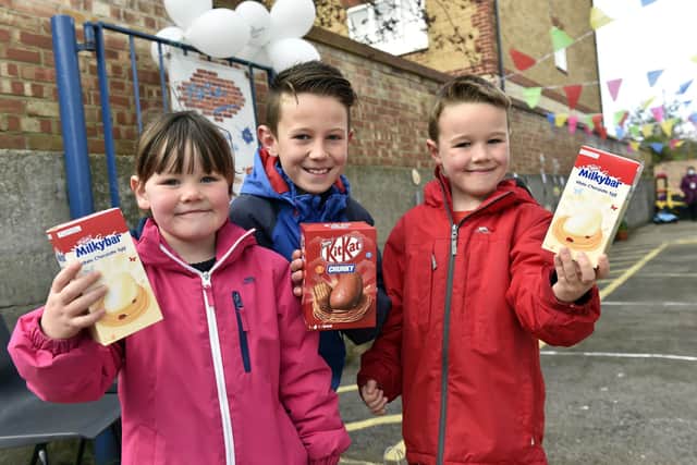 From left, Carmen Taylor, four, Lincoln Taylor, 10, and Ellis Taylor, six with their Easter eggs.
Picture: Allan Hutchings (030421-3022)