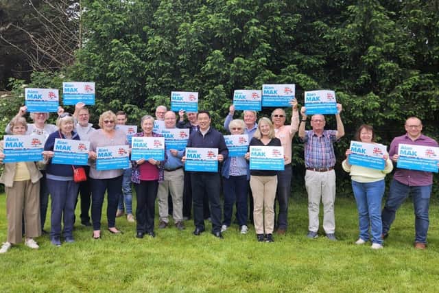 Havant MP candidate Alan Mak (centre) with supporters
