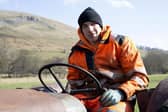 Reuben Owen sits on his vintage tractor. (Pic credit: Channel 5)