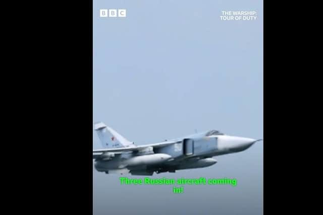 Footage from new BBC series The Warship: Tour of Duty shows the moment Russian jets appear to threaten HMS Queen Elizabeth. Credit: BBC