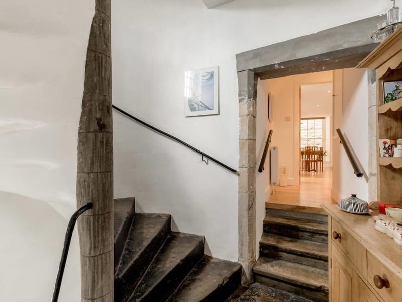 Second floor landing leading to main living area.