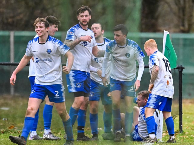 Clanfield celebrate Olly Long's late winner at Andover New Street Swifts. Picture by Richard Murray
