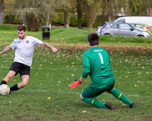 Portchester Rovers (blue) v Pompey Dynamos. Picture: Mike Cooter